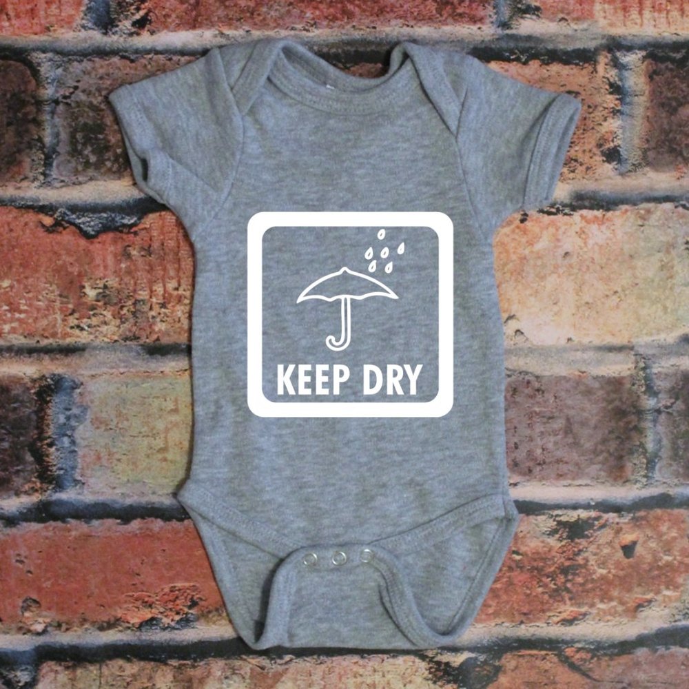Keep Dry Warning Label Baby Onesie